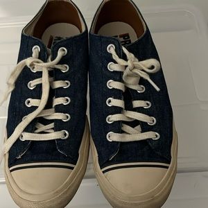 Denim blue pair of pro keds size 10.5 has three stripes on both sides